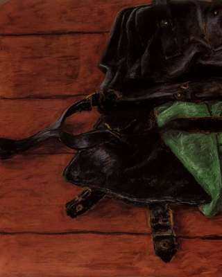 Green Scarf in Black Bag on Red Floor